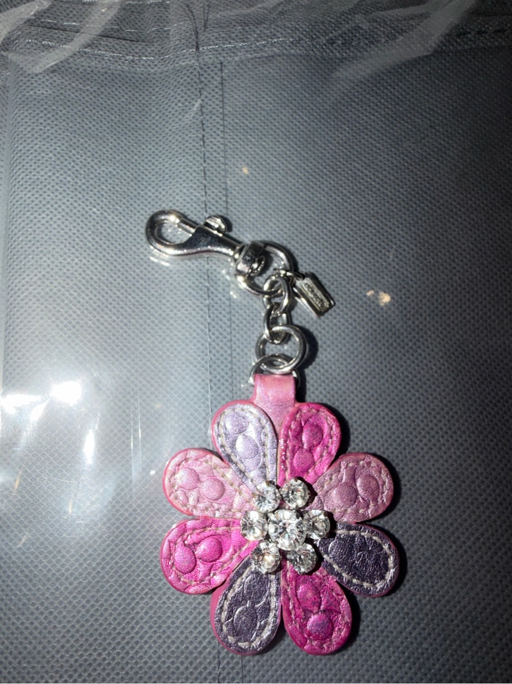 Y2K-era Coach Crystal Daisy Signature Patchwork Flower Bag Charm.